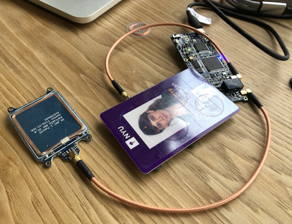 photo of my nyu id and some cloning hardware